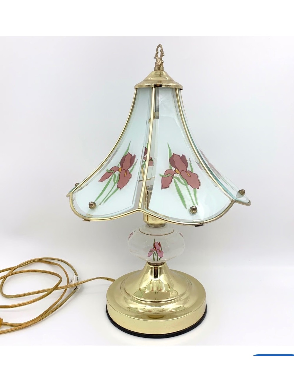 Brass table lamp with floral stained glass shade